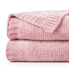 two pink blankets folded on top of each other