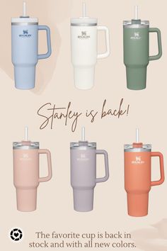 four different colored coffee mugs with the words, staffy is back