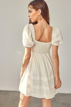 Final Sale - Get it before it's gone! You'll look as sweet as can be in the Josephine White Ruched Puff Sleeve Mini Dress! Woven fabric shapes this dress that has puff sleeve with ruffle trim, a sweetheart neckline, and a ruched bodice. A fitted waist tops an A-line mini skirt with tiers of ribbons. Smocked back for a perfect fit! Lined. DETAILS & CARE 65% Cotton/ 35% Polyester. Rayon lining. Machine wash cold. Imported. Puff Sleeve Mini Dress, Boho Pink, A Line Mini Skirt, Puff Sleeve Dress, Ruched Bodice, Pink Boho, Dress Boho, Puffed Sleeves Dress, Ruched Dress