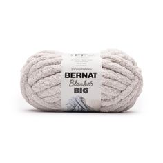 bernat big yarn ball in white, on a white background with the words bernat written