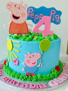 a peppa pig birthday cake with the number four on it