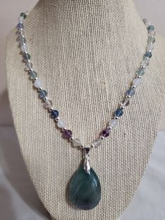 This teardrop fluorite pendant is truly one of a kind, the stones are highly polished.  Rainbow fluorite-balances Chakras, mind, body and spirit. Healing Teardrop Crystal Necklace With Natural Stones, Fluorite Pendant Necklace For Healing, Healing Fluorite Pendant Necklace, Fluorite Necklace, Mind Body And Spirit, Les Chakras, Chakra Balancing, Rainbow Fluorite, Mind Body