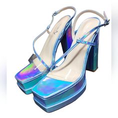 Vivian Blue Holographic Y2k Chunky Platform Heels Size: Women's 10 Condition: New Elevate Your Fashion Game With These Stunning Vivian Blue Holographic Y2k Chunky Platform Heels In Size 10. Whether You're A Lover Of All Things Y2k Or Simply Want To Make A Statement With Your Footwear, These Heels Are The Perfect Choice. The Holographic Finish Adds A Futuristic Touch, Making Them Ideal For Both Nostalgic Retro Looks And Modern, Avant-Garde Outfits. Crafted With Attention To Detail, These Chunky P Blue Chunky Platform Heels With Round Toe, Blue Chunky Platform High Heels, Avant Garde Outfit, Chunky Platform Heels, Arche Shoes, Y2k Nostalgia, Future Of Fashion, Platform Shoes Heels, Retro Looks