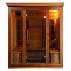 a wooden sauna with glass doors on the front and back sides, in an indoor setting