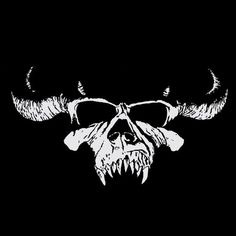 the logo for danzig is shown in white on a black background with an image of a demon's head