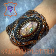 Hand Tooled Leather Bohemian Jewelry, Unique Leather Bracelet For Gift, Bohemian Hand Tooled Leather Bracelets, Bohemian Leather Cuff Bracelet As Gift, Bohemian Leather Cuff Bracelet Gift, Unique Leather Jewelry For Festivals, Handmade Custom Leather Bracelet, Unique Hand Tooled Jewelry, Handmade Brown Labradorite Jewelry