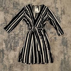 H&M Black And White Striped Dress With Belt. Great Condition - Stretch Fabric, Never Worn, Tags Attached. H&m V-neck Dress For Brunch, H&m V-neck Mini Dress For Brunch, H&m V-neck Mini Dress For Day Out, H&m V-neck Fall Dresses, H&m White V-neck Midi Dress, H&m V-neck Mini Dress For Date Night, Chic V-neck Mini Dress By H&m, H&m White V-neck Mini Dress, Black And White Striped Dress