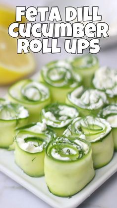 cucumber rolls are arranged on a plate with the words feta dill cucumber roll ups