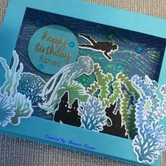 an ocean themed birthday card with sea animals and corals