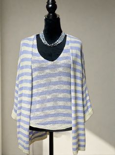 The perfect finishing touch to your effortless summer look, this striped cardigan adds a layer of cozy comfort whenever you need it. Crafted from the same lightweight cotton blend as the matching tank top, it features a relaxed fit throughout with loose, wide sleeves that offer a slouchy silhouette. Looking for a snugger fit? No problem! This cardigan is generously sized, so you may want to consider sizing down for a cozier feel. Pair it with the matching Striped Knit Tank Top (sold separately)