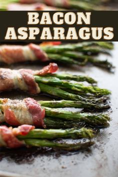 bacon wrapped asparagus on a baking sheet with the words bacon asparagus