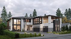 a large modern house with lots of windows