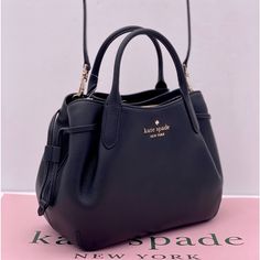 Brand New With Tag Kate Spade Dumpling Small Satchel Product Details Color: Black Measurements 9.4" W 7.9" H 5.2" D Handle Drop: 4.25" Features Strap Drop: 22" Metal Pinmount Logo Closure Type: Magnetic Snap Closure With Middle Zip Compartment Dust Bag Included: No Interior: Back Zip Pocket Exterior: Front And Back Slip Pockets Materials Pebbled Leather Lining: Two Way Spade Jacquard Lining Imported Style Number K8135 Kate Spade Crossbody Satchel For Evening, Kate Spade Black Satchel For Evening, Kate Spade Satchel With Removable Pouch For Evening, Kate Spade Evening Satchel With Removable Pouch, Kate Spade Black Shoulder Bag For Evening, Black Kate Spade Shoulder Bag For Evening, Kate Spade Black Evening Shoulder Bag, Kate Spade Black Shoulder Bag With Top Carry Handle, Kate Spade Black Crossbody Satchel