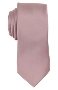 Solid coloring brings effortless versatility to a tie crafted from polished satin to elevate any formal or semiformal look. 2 3/4" width; 58" length 100% polyester Dry clean Imported Spring Silk Ties For Formal Occasions, Spring Formal Tie, Formal Ties For Spring, Elegant Silk Ties For Spring, Satin Fitted Ties For Semi-formal Occasions, Elegant Pink Ties For Semi-formal Occasions, Formal Satin Ties, Formal Suit And Tie Accessories For Spring, Solid Satin Ties For Formal Occasions