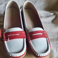 Comfort Life Leather Red And White Loafers. They Are Supposed To Be A Sz 10 But I Believe They Are A 9.5. Leather Upper, Cushioned Support Insole, Rubber Bottom. Red Moccasins With Red Sole, White Round Toe Boat Shoes With Rubber Sole, White Boat Shoes With Rubber Sole And Round Toe, Red Round Toe Moccasins, White Boat Shoes With Rubber Sole, Casual Red Loafers With Round Toe, Red Casual Summer Loafers, Red Slip-on Moccasins For Spring, Red Closed Toe Casual Loafers