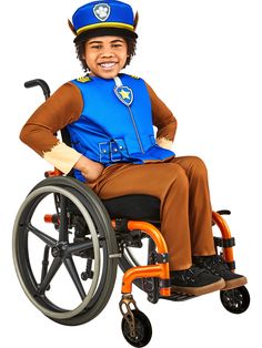 a man in a wheel chair wearing a blue hat and brown pants is smiling at the camera