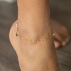 This dainty anklet features a 2.5mm satellite ball chain in 18k gold vermeil or sterling silver.Gold vermeil jewelry gives you the look, feel and timelessness of gold without the cost! Gold vermeil is 18k thick gold plating over sterling silver.All orders come in a beautifully branded gift box or velvet baggie - ready for gifting!9 inches with 1 inch extender chain for 10 inches total length. Custom sizing available upon request.******************************************Shipping and Processing I Cheap Casual Gold Anklets, Cheap Adjustable Elegant Anklets, Cheap Dainty Anklets With Adjustable Chain, Cheap Gold Metal Anklets, Dainty Cheap Anklets As Gift, Cheap Wedding Anklets For Women, Gold Anklet Coin, Cheap Gold Anklets For Party, Cheap Gold Anklets For Spring