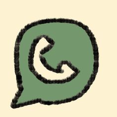 a green and black speech bubble with an arrow drawn on it's back side