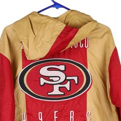 Description:Vintage The San Francisco 49ers red Nfl jacket, fits medium.GENDER: mens CONDITION: good - mark on the front as pointed out.STYLE: jacketERA: 1990sCOLOUR: redFABRIC: polyester Red Throwback Outerwear For Sports Events, Russell Athletic, Just Peachy, San Francisco 49ers, Wholesale Shoes, Beauty Bag, Cardigan Coat, Board Shorts, Active Wear Tops