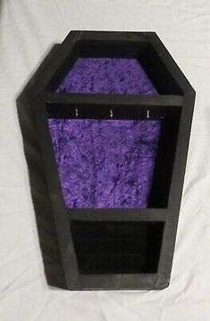 a purple and black box with two compartments