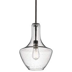 a clear glass light fixture hanging from a ceiling