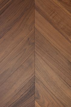 an image of wood flooring that looks like herringbones