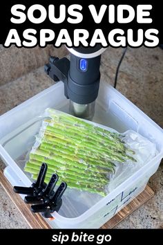 there are several pieces of asparagus in a container with the words sous vide asparagus on it