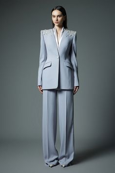 Crafted with premium quality materials, these pants offer a sophisticated and exclusive look. The ribbed crepe texture adds a touch of elegance, while the straight silhouette provides a flattering fit. Elevate your wardrobe with these timeless pants. Material: Crepe (White), Satin Crepe (Grey) *Product color is varied due to studio lighting. Elegant Semi-formal Pantsuit Trousers, Elegant Pantsuit With Pressed Crease Trousers, Elegant Suits With Straight Pants And Pressed Crease, Elegant Suits With Pressed Crease And Straight Pants, Elegant Evening Pantsuit With Ankle-length Pants, Luxury Tailored Trousers Pantsuit, Elegant Tailored Trousers Pantsuit, Luxury Formal Pantsuit With Straight Pants, Elegant Evening Suits With High-waisted Pants