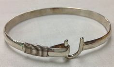 Sonya St. Croix Island Carribean Sterling Silver Hammered Cuff Bangle Bracelet with Cool Hook Closure. $68.00, via Etsy. Tomboy Clothing, Caribbean Jewelry, Island Caribbean, St. Croix, St Croix, Enjoying Life, Cuff Bangle Bracelet, Sparkle Jewelry