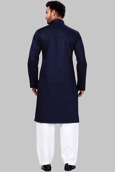 Product Features: Top Color: Navy Blue Bottom Color: White Work: Solid Top Fabric: Fine poly and cotton mix Bottom Fabric: Fine poly and cotton mix Pack Of: 1 Kurta : 1 Salwar Occasion: Partywear Disclaimer: There will be slight difference in digital to actual image Navy Blue Shalwar Kameez, Luxury Blue Straight Kurta, Navy Blue Shalwar Kameez Men, Blue Kurta With Stand Collar, Solid Kurta Set, Navy Blue Kurta, Kurta Set, Solid Tops, Top Fabric