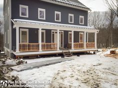 a house is shown with snow on the ground