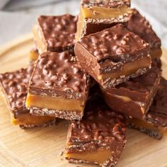 chocolate and peanut butter bars stacked on top of each other