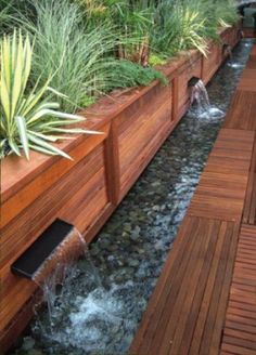 a wooden deck with water running through it