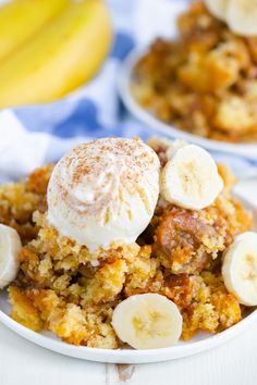 a plate topped with banana cobbler next to a bowl of ice cream and bananas