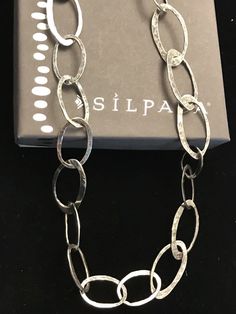 "Silpada sterling silver hammered link necklace with a lobster clasp, 19\" long. Excellent condition, previously a display item. Box not included." Hammered Link Necklace For Gift, Silver Link Necklace, Silpada Jewelry, Hammered Sterling Silver, Glass Pendant Necklace, Hammered Silver, Multi Strand Necklace, Necklace Sterling Silver, Tiffany Heart