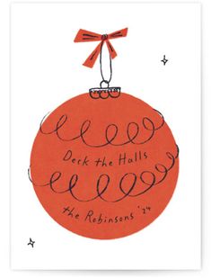 an orange christmas ornament with the words deck the hall on it