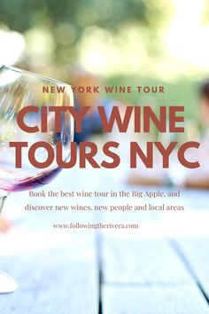 a wine glass sitting on top of a wooden table with the words city wine tours nyc