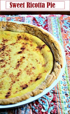 there is a pie on the table ready to be eaten and served for dinner or dessert