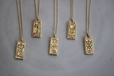 Gold plated Tarot Card charms on a 18k gold plated chain. *Available lengths: 16, 18, 20 inches Mystical Engraved Gold Jewelry, Mystical Gold Charm Necklace Gift, Mystical Engraved Gold Necklace, Mystical Gold Engraved Necklace, Magical Gold Nickel-free Jewelry, Tarot Card Necklace, Heart Moon, Card Necklace, Moon Stars