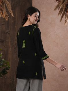 Traditional Straight Kurta With Intricate Embroidery, Festival Embroidered Straight Kurta Top, Black Embroidered Cotton Sets, Traditional Black Embroidered Festive Top, Traditional Black Embroidered Top For Festive Occasions, Fitted Cotton Folk Kurta, Intricate Embroidery Cotton Fabric, Traditional Cotton Kurta With Woven Motifs, Unstitched Cotton Embroidered Fabric With Motifs