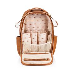 Itzy Ritzy Your forever bag for baby & beyond, every (little) step along the way! The Boss Plus Backpack is everything you love in our original Boss Backpack with a sleek design and premium features. Elevated with thoughtful organization and style, this bag is perf to take on your new babe’s journey – from all packed up to welcome baby at the hospital to adventurous playdates to an amazing work, pumping or me-time bag for you. • 19 total pockets (6 external and 13 internal) • Includes coordinati Dipper Bag, Rubber Bags, Stylish Diaper Bag, Backpack Diaper Bag, Itzy Ritzy, Stroller Straps, Diaper Changing Pad, At The Hospital, Baby Diaper Bags