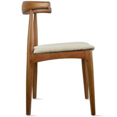 a wooden chair with a white cushion on it's seat and armrests