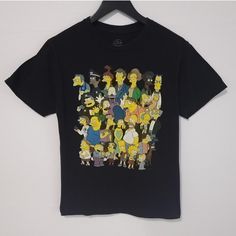 Vtg Simpsons Characters T-Shirt The Simpsons Men's Size Small Characters Vtg Graphic Print T-Shirt In Perfect Condition Measurements Pit: 18/46cm Length: 26/66cm Condition: 10/10 Size S Machine Washed 100% Cotton #Cartoon #Thesimpsons #Simpsons #Adultswim #Cartoontees Vintage Black Shirt For Fans, Retro Black Top With Cartoon Print, Yellow Pop Culture Tops For Streetwear, Vintage Black Top With Cartoon Print, 90s Style Black T-shirt With Vintage Print, Black Vintage Print Short Sleeve Top, Retro Yellow T-shirt For Fan Merchandise, Cartoon Network Shirt, Vintage Black T-shirt With Cartoon Print