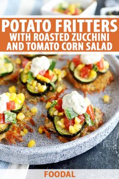 potato fritters with roasted zucchini and tomato corn salad on a plate