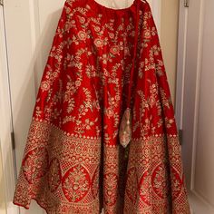 Brand New Wedding Lehenga With Two Dupattas Never Worn! Red Wedding Choli With Tilla Detailing, Red Tilla Choli For Wedding, Red Choli With Tilla For Wedding, Red Traditional Wear With Tilla For Wedding, Elegant Red Traditional Wear For Ceremony, Red Lehenga With Pallu For Wedding, Red Lehenga For Formal Festive Occasions, Formal Red Lehenga With Intricate Embroidery, Red Traditional Wedding Wear With Gold Embroidery