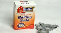 a box of baking soda next to some spoons and a bottle of queen baking soda