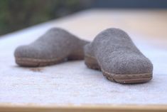 These cappuccino clogs for women are made from 100% cruelty free wool. Boiled wool clogs are felted using only water and natural olive oil soap. Rubber soles are are stitched and glued to the clogs by professional shoemaker. Felted wool shoes are very warm, soles makes them suitable for outside wearing. 100% wool felt is breathable, provides natural insulation, keeps your feet warm and cozy. Choose you size according to our sizing chart in picture 5. Subscribe to our Woolenclogs mailing list for Winter Felt Slip-on Clogs, Comfortable Winter Clogs With Leather Sole, Wool Clogs With Rubber Sole And Round Toe, Casual Wool Clogs For Winter, Felt Slip-on Clogs With Rubber Sole, Felt Clogs With Rubber Sole Slip-on, Slip-on Felt Clogs With Rubber Sole, Felt Clogs With Rubber Sole And Round Toe, Brown Wool Slippers With Round Toe