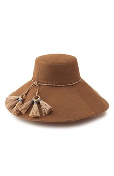 A wide, curved brim enhances the breezy sophistication of this linen hat finished with breezy tassel accents. Interior size-adjuster band UPF 50+ sun protection Cotton lining Linen Imported Linen Hat, Helen Kaminski, Upf 50, Sun Protection, Tassels, Nordstrom, Sun, Band, Hats