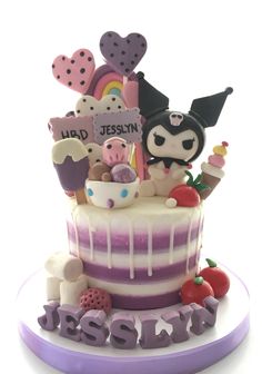 there is a cake decorated with many items