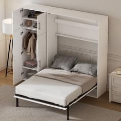 a bed with a pull out shelf underneath it